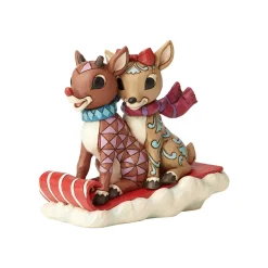 Rudolph And Clarice Sledding